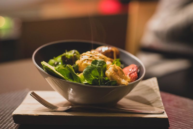 Mod Pizza chicken and greens salad with grilled protein