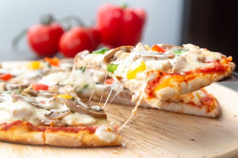 Mod Pizza margherita style pizza with fresh basil